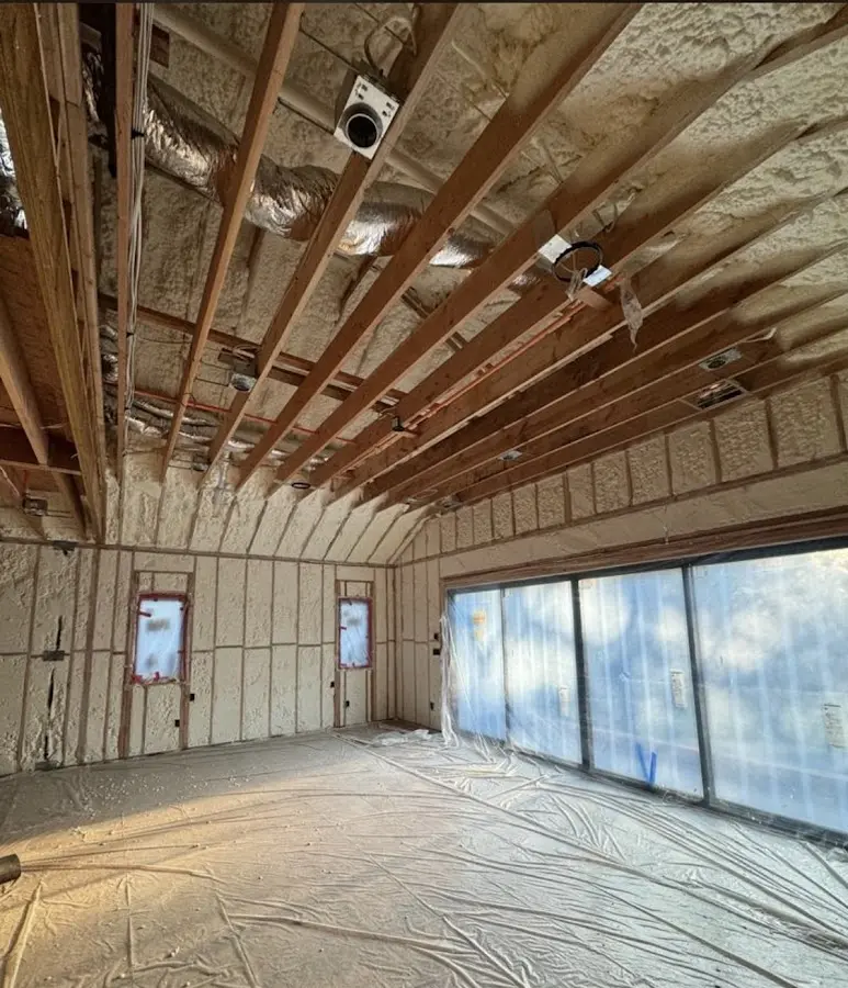 Interior walls and ceiling insulated with spray foam during new construction in Cheektowaga